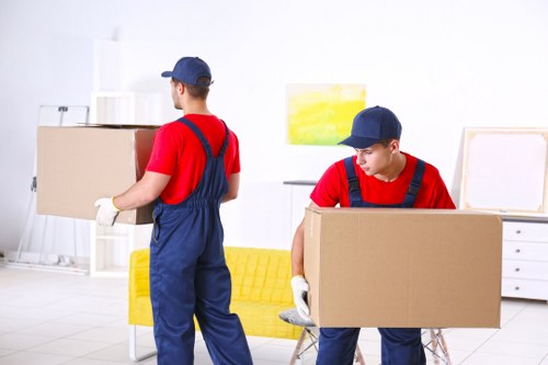 Home removals team planning a move in a Waddon residential street