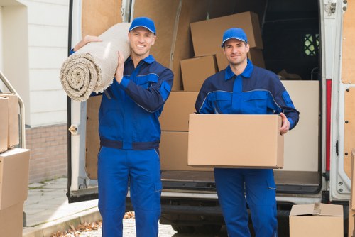 Professional removals crew loading household items in Waddon
