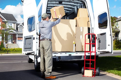 Local moving van loading boxes near a Waddon home
