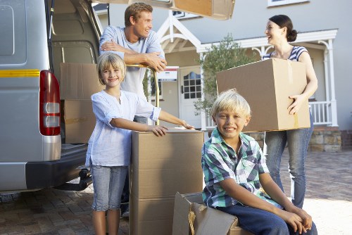 Careful loading of boxes and furniture into a moving van