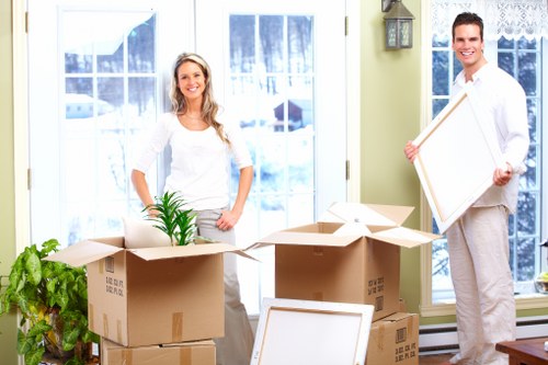 Local movers loading furniture and boxes for a Waddon move